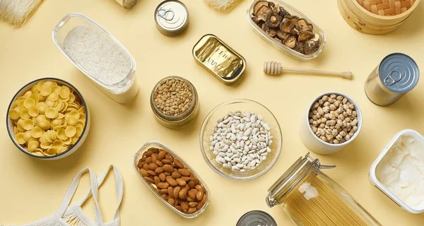 creative-flatlay-pantry-staples-glass-600nw-1685571238